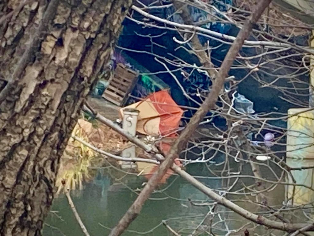 homeless encampment under the bridge